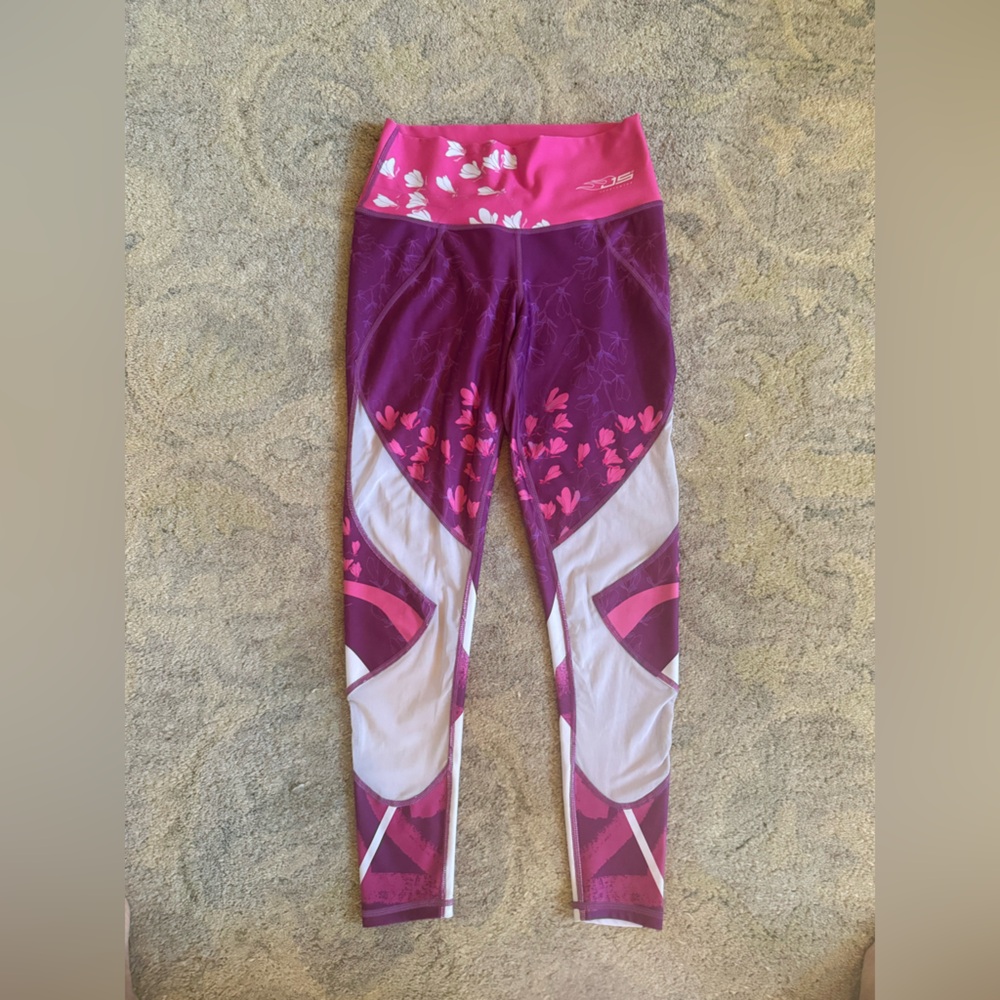 Leggings from Jcross sportswear  pink multi colors with white mesh.